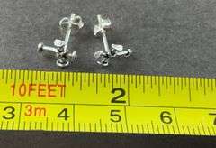 Sterling silver cross stud earrings .70