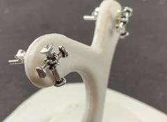 Sterling silver cross stud earrings .70