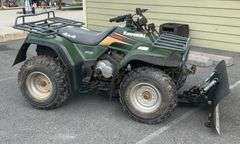 Kawasaki Bayou 300 4-Wheeler, 4x4. Front 4 foot blade and winch.