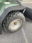 Kawasaki Bayou 300 4-Wheeler, 4x4. Front 4 foot blade and winch.