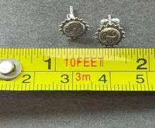 Sterling silver sun stud earrings .56g