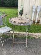 Decorative Metal Bird Sculpture, Foldable Patio Table, and Folding Chair