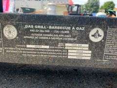Coleman Gas Grill with Side Burner and Dual Lidded Cooking Surface