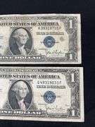 Four silver certificates all 1935 with series D(2), G, and F