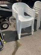 Four Stackable Plastic Patio Chairs