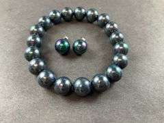 Sterling silver peacock shell pearl stud earrings and stretch bracelet