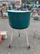 Metal Barrel-Style Grill with Hinged Lid and Rolling Stand