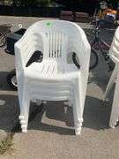 Four Stackable Plastic Patio Chairs