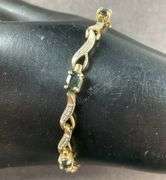 Gold Tone Silver Bracelet With Sapphires Made In China 7.9 grams Sterling Silver size 7.5"