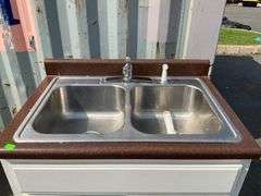 White Cabinet With Dual Stainless Steel Sink and Brown Countertop