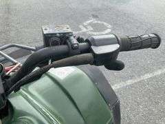 Kawasaki Bayou 300 4-Wheeler, 4x4. Front 4 foot blade and winch.
