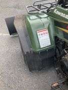 Kawasaki Bayou 300 4-Wheeler, 4x4. Front 4 foot blade and winch.