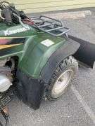 Kawasaki Bayou 300 4-Wheeler, 4x4. Front 4 foot blade and winch.