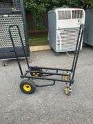 Black Metal Four-Wheel Utility Cart with Yellow Accents