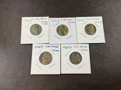 Five silver Jefferson nickels