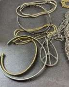 Assorted costume jewelry , Necklaces, bracelets, rings