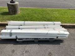 Bundles of White Trim Molding on Pallet