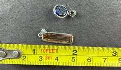 Two sterling silver pendants