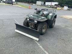 Kawasaki Bayou 300 4-Wheeler, 4x4. Front 4 foot blade and winch.