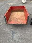 Red Metal Tag-Along Wagon With Missing Back Panel