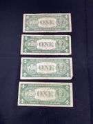 Four silver certificates all 1935 with series D(2), G, and F