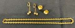 Monet goldtone chain 20in, pair of clip on earrings, and floral pins