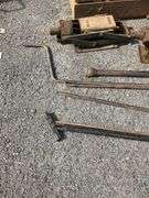 Two Wooden Crates With Scissor Jacks and Shop Light