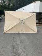 Beige Patio Umbrella Missing Top, 9’L x 6’W