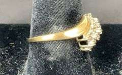 10k yellow gold diamond cluster ring size 7.25 tested and weighs 2.1g