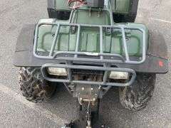 Kawasaki Bayou 300 4-Wheeler, 4x4. Front 4 foot blade and winch.
