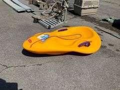 Yellow Rubbermaid Snow Sled with Rope Handle