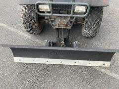 Kawasaki Bayou 300 4-Wheeler, 4x4. Front 4 foot blade and winch.