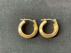 14k yellow gold hoop earrings tested and weighs 1 grams