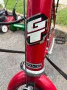GT Palomar Red Bicycle with Rear Cargo Rack and Triple Triangle Technology