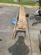 Wooden Sawhorse, Plastic Head Shovel with Wooden Handle, Metal Head Rake, and Chimney Sweep Brush