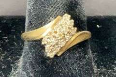10k yellow gold diamond cluster ring size 7.25 tested and weighs 2.1g
