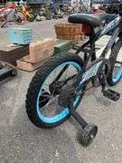 Huffy Kids Bike with Training Wheels and Decorative Graphics