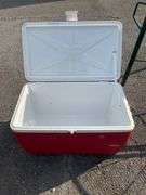 Red Igloo Cooler with Hinged Lid and Side Handles