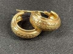 14k yellow gold hoop earrings tested and weighs 1 grams