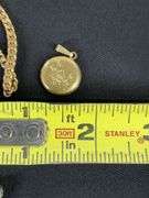 Gold filled locket pendant, match box, pill box, goldtone bracelet personalized “Thelma” , and three chains