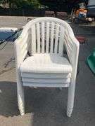 Four Stackable Plastic Patio Chairs