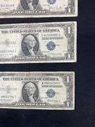 Four silver certificates all 1935 with series D(2), G, and F