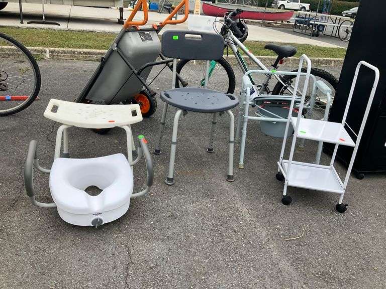 Medical Equipment Lot with Seats, Commode, and Two-Shelf Mobile Unit