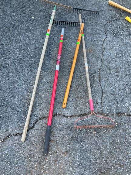 Four Gravel Rakes with Mixed Handles