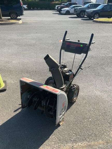 Yard Machines Snow Blower, 24” cut path, 5hp per seller engine starts but needs to remain on Choke to run, however we have not been getting it to start so bid and buy with the understan