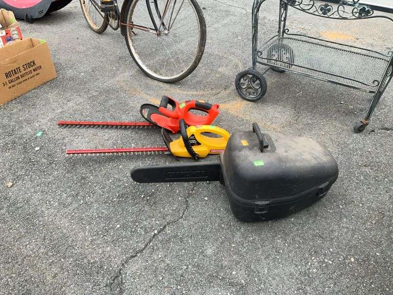 Power tools lot, Craftsman Chainsaw with case, 2-hedge clippers no battery for one no charger for the other. Lots sells as is condition