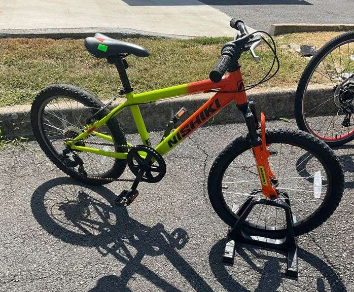 Nishiki 20-Inch Kids’ Mountain Bike with Neon Green and Orange Frame