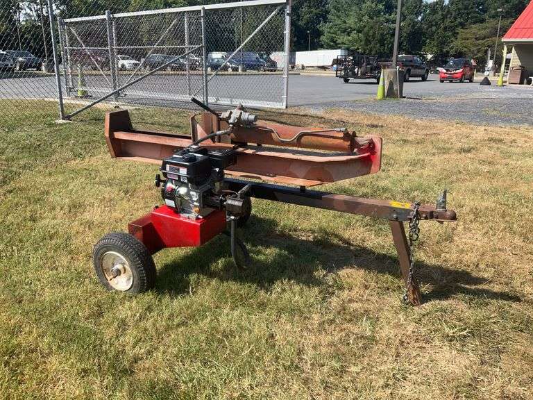 Huskie Wood Splitter, towable pull type with 2” Ball. Has a new Predator Gas Engine 212cc.  READ MORE
