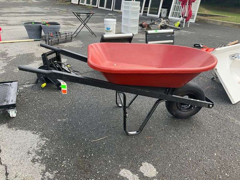 Wheelbarrow with Plastic Hopper, Wooden Handles, Metal Frame, and Single Pneumatic Tire