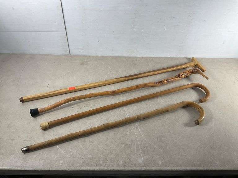 Four Canes with Assorted Tips and Handle Designs - Hash Auctions